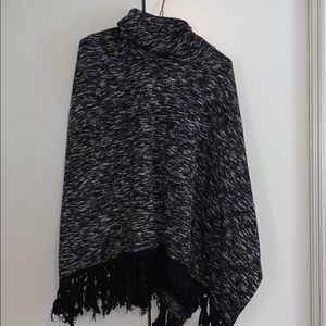 Black turtle neck poncho